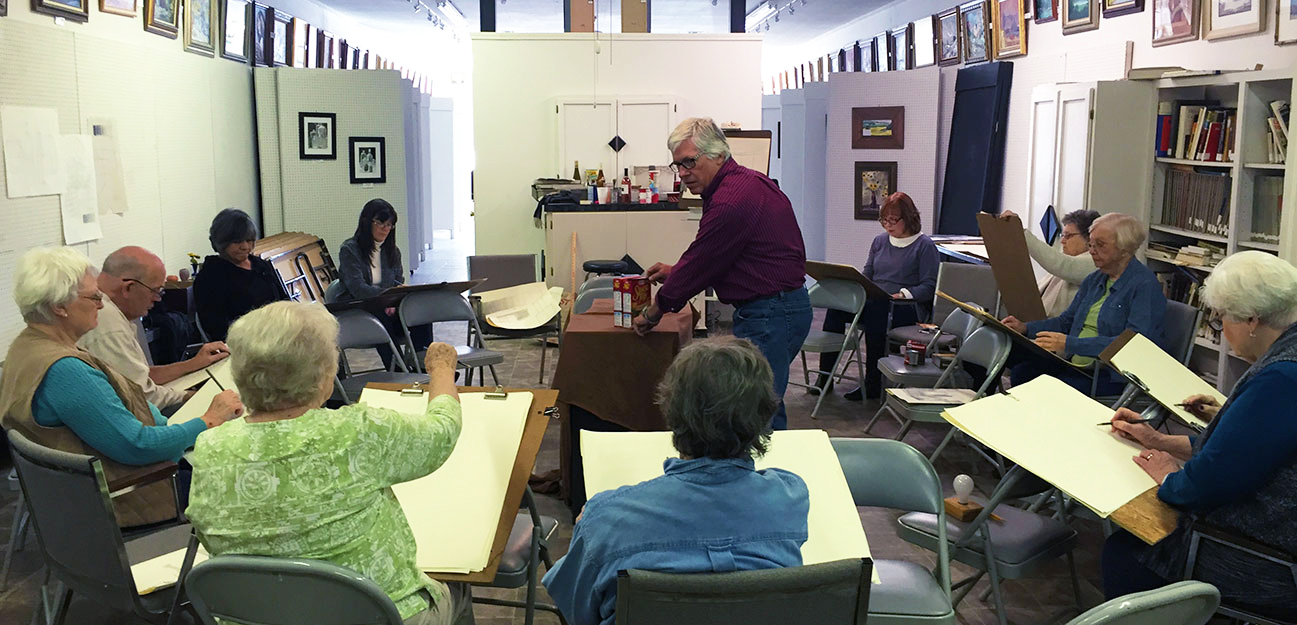 Older adults in a painting class